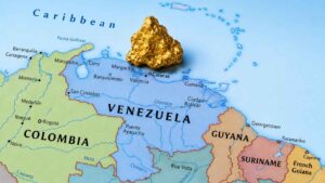 Carte du Venezuela et de la région caraïbe avec une pépite d’or, illustrant l’opération militaire dans une zone aurifère stratégique.
