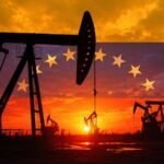Pompes à pétrole au Venezuela sur fond de drapeau vénézuélien au coucher du soleil.